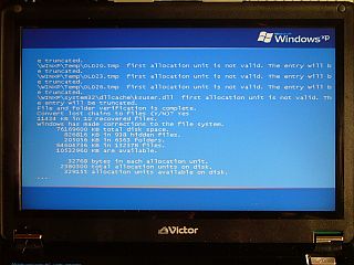 図7:致命的エラー後の回復処理 <click>→図8:XP7310仕様表の一部